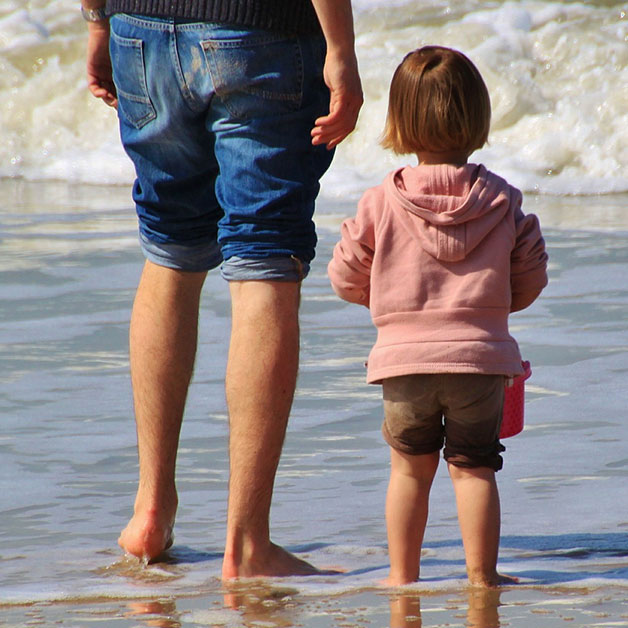 Father and Daughter in Ocean